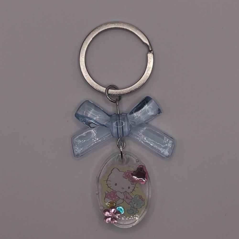 Hello Kitty Keychain with Blue Bow and Pink Accents